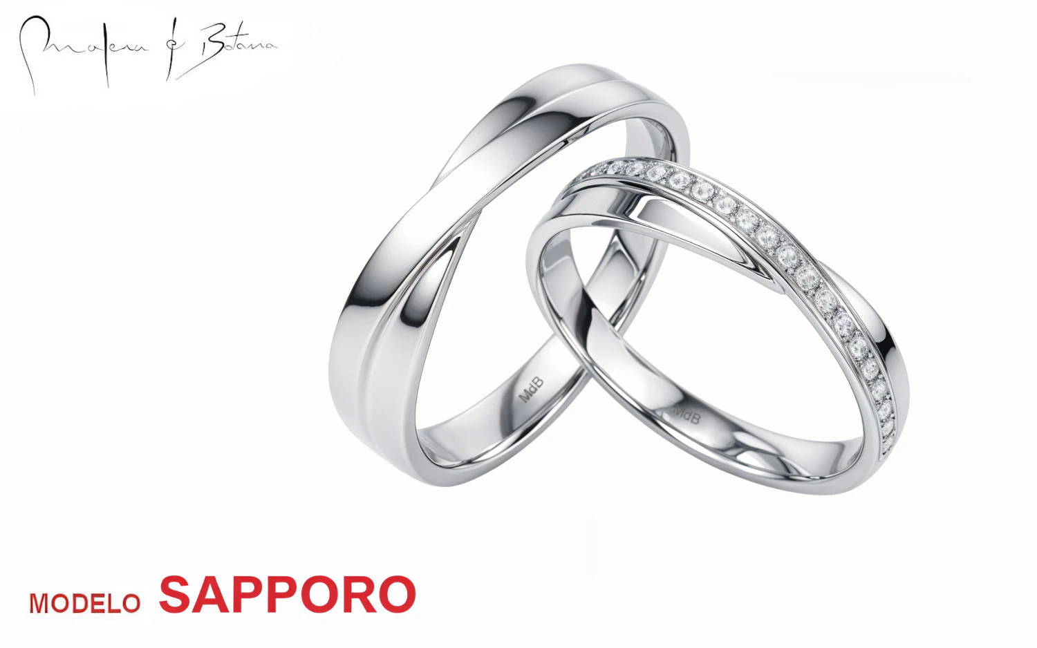 Par de anillos de matrimonio de oro blanco con diseño entrelazado, uno con una fila de piedras brillantes, acabado pulido y sofisticado.