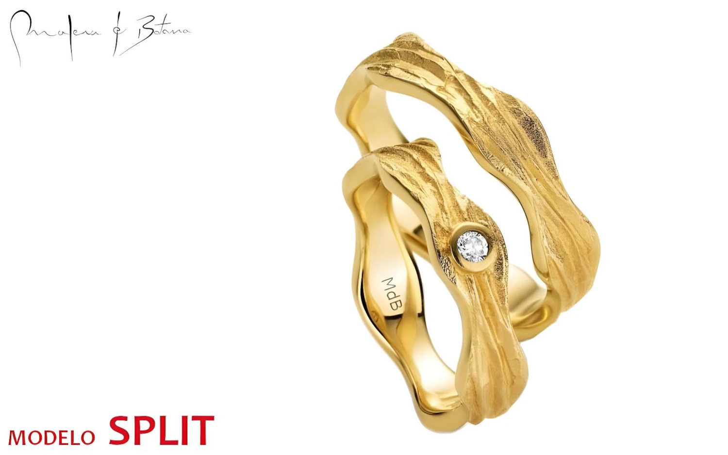 Par de anillos de boda en oro amarillo con patrón ondulado irregular y un piedra incrustada