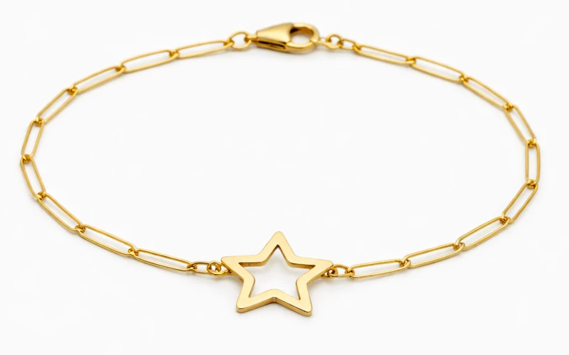 Pulsera de oro con dije de corazón, diseño minimalista y elegante